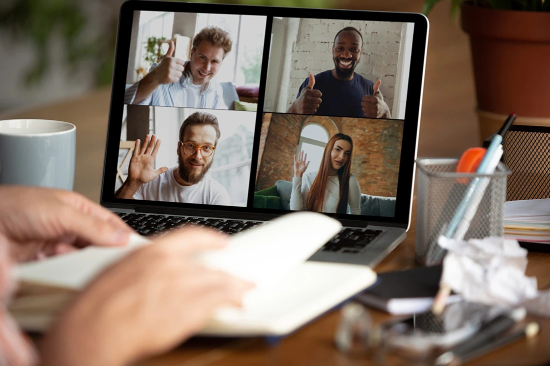 Businessman, manager in front of monitor during online conference with colleagues and team Working from home during coronavirus or COVID 19 quarantine