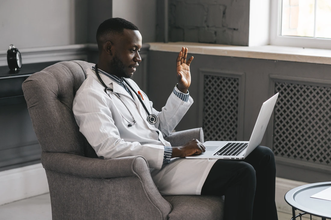 telehealth with virtual doctor appointment and online therapy session Black doctor online conference